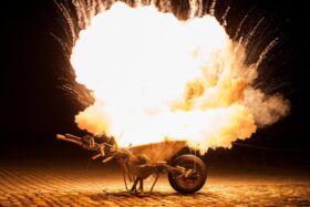 Explosion occurring near a wheelbarrow.